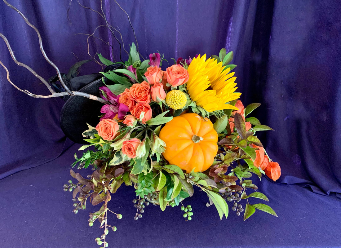 Nova Scotia produces beautiful fruits and vegetables in the fall. It’s a wonderful opportunity to incorporate fruits and vegetables, especially pumpkins and gourds, into October arrangements. Photo by Foraged Florals.